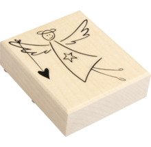 Stempel mit Engelmotiv auf Holzblock