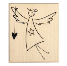 Stempel mit Engelmotiv auf Holzblock