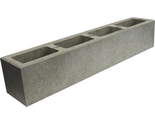 Grauer Betonblock mit Hohlräumen