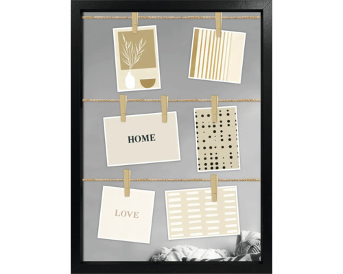 Dekorativer Bilderrahmen mit Schnüren und kleinen Wäscheklammern zum Aufhängen von Fotos oder Karten