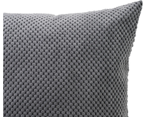 Dekokissen mit grober Strickstruktur