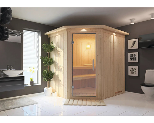 Badezimmer mit Ecksauna aus Holz und Glastür