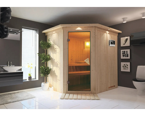 Plug & Play Sauna Karibu Achat VII inkl. 3,6 kW Ofen u.ext.Steuerung mit Dachkranz und bronzierter Ganzglastüre Helle Badezimmerszene mit einer Ecksauna aus Holz und Glastür.