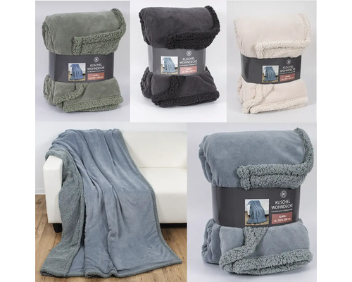 Wohndecke Coral Fleece blau creme grün anthrazit 200 x 150 cm zufällige Farbauswahl Mehrere Kuscheldecken in verschiedenen Farben, teilweise verpackt, teilweise auf einem Sofa drapiert.