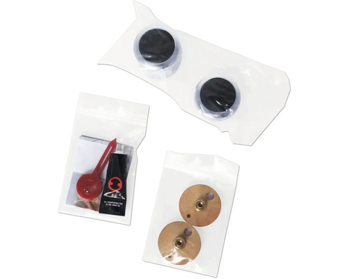 Montage-Set mit Unterlegscheiben, Schrauben und Montagepaste in verschiedenen Verpackungen