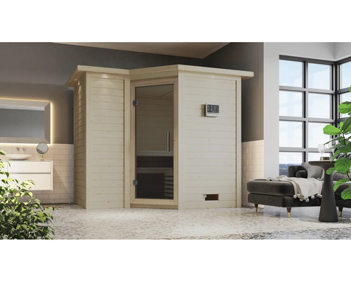 Helle Holzsauna mit Glastür in einem Badezimmer mit Waschtisch und Couch