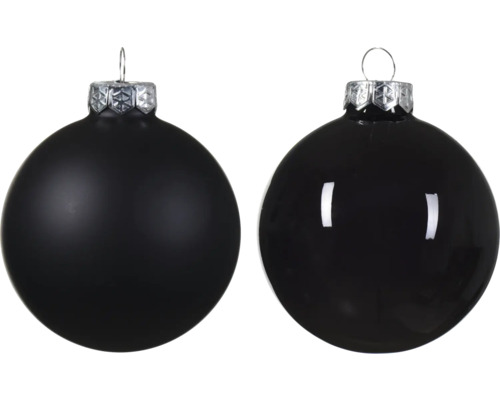 Zwei schwarze Weihnachtskugeln mit matter und glänzender Oberfläche