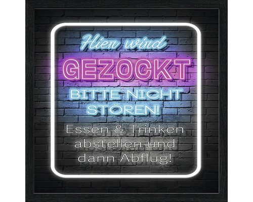 Dekorativer Leuchtrahmen mit der Aufschrift Hier wird gezockt. Bitte nicht stören! Essen und Trinken abstellen und dann Abflug!