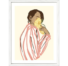 Gerahmtes Bild mit einer Frau, die an einer Blume riecht