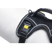 Detailansicht eines schwarzen Hundegeschirrs mit gelbem Verschluss