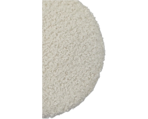 Detailaufnahme eines runden, texturierten Sitzkissens