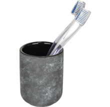 Zahnbürsten in einem Zahnputzbecher