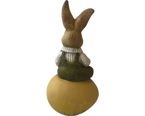 Dekorativer Hase auf einem Ei als Osterdekoration