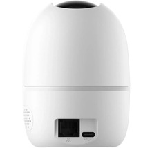 Rückansicht einer weißen Überwachungskamera mit Anschlüssen