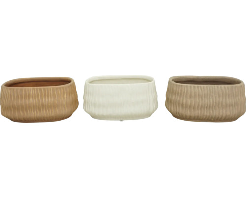 Drei Pflanzgefäße aus Keramik mit geriffelter Oberfläche