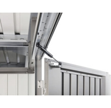 Detailansicht eines Metall-Geräteschranks mit Gasdruckfeder