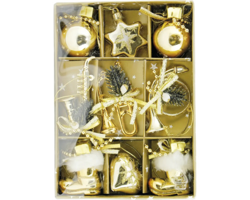Verschiedene goldfarbene Christbaumkugeln in einer Verpackung
