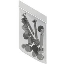 Befestigungsmaterialien wie Schrauben und Abdeckkappen in einer transparenten Verpackung.