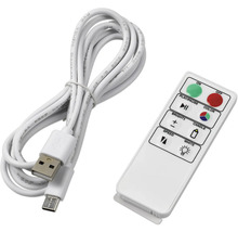 Weißes USB Kabel und Fernbedienung