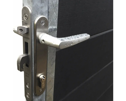 Detailansicht eines Locinox-Torschlosses mit Griff und Schlosskasten an einem Gartentor