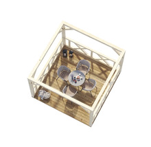 Holzpavillon mit Gartengarnitur auf Holzterrasse