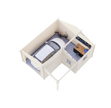 Garage mit Werkstattbereich, einschließlich Auto, Fahrrad und Werkbank