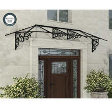 Haustürvordach aus Metall mit dekorativen Ornamenten über einer Holztür an einer Natursteinwand, Symbol für eingetragenes Design.