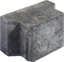 Einzelner Betonpflasterstein mit Nut und Feder