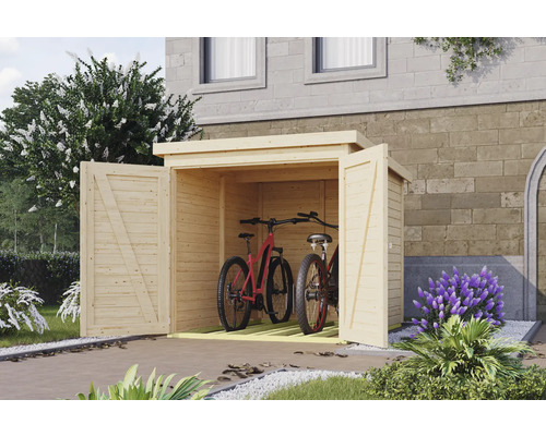 Holzfahrradhaus mit zwei offenen Türen und Fahrrädern darin vor einem Haus