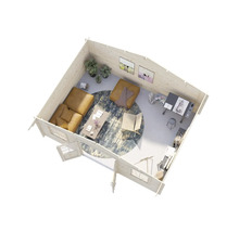 Innenansicht eines Holzhauses mit Sofa, Tisch, Teppich und Arbeitsbereich.