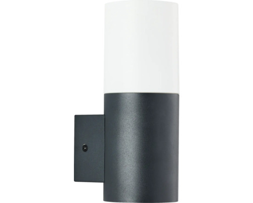 Wandleuchte in zylindrischer Form mit schwarzem Sockel und weißem Lampenschirm