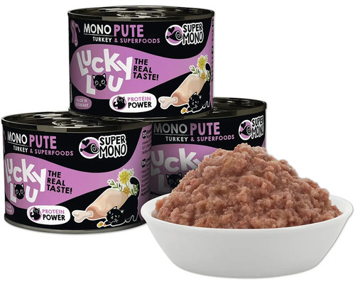 Drei Dosen Katzenfutter mit Truthahn und Superfoods und eine Schüssel mit Katzenfutter