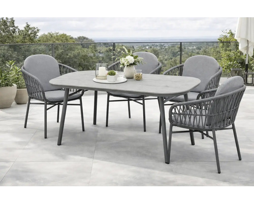 Gartensitzgruppe mit grauem Tisch und vier Stühlen mit geflochtener Optik und grauen Sitzkissen