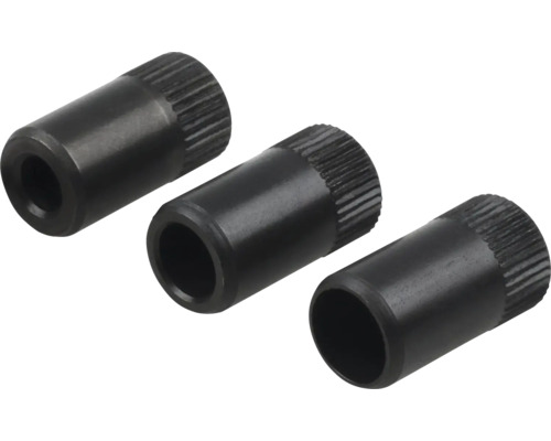 Drei gerändelte Metallhülsen