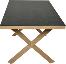 Rechteckiger Tisch mit dunkler Platte in Steinoptik und X-förmigem Gestell aus hellem Holz.