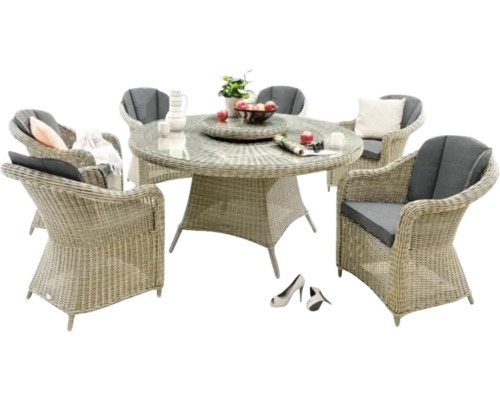 Gartensitzgruppe mit Rattanstühlen und rundem Glastisch für den Außenbereich