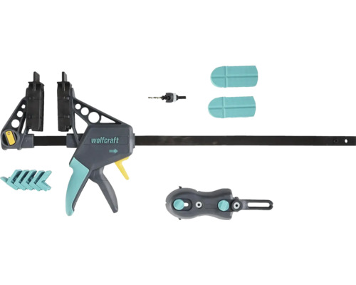 Wolfcraft Einhandzwinge mit Zubehörset bestehend aus Bohrer, Schutzkappen und Adaptern.