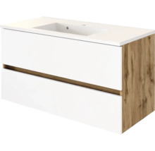 Moderner Waschtischunterschrank mit integriertem Waschbecken, zwei Schubladen mit Griffmulden, weiße Front und Seitenwand in Eichenoptik.
