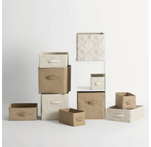 Mehrere Aufbewahrungsboxen aus Stoff in verschiedenen Größen und Designs