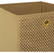 Detailansicht einer Stoffbox mit gewebtem Einsatz und Metallöse