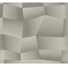 Graue Vliestapete mit geometrischem dreidimensionalem Muster aus unregelmäßigen Vielecken und feiner Linienstruktur.