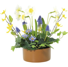 Künstliches Blumengesteck mit Narzissen, Traubenhyazinthen und Gänseblümchen in einem Topf