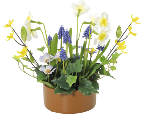 Blumenarrangement mit Narzissen, Traubenhyazinthen und gelben Zierblüten im Topf