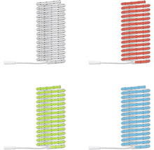 Vier Rollen flexibler LED-Streifen in den Lichtfarben Weiß, Rot, Grün und Blau mit Anschlusskabeln.