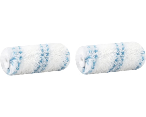 Zwei weiße Farbwalzen mit Farbflecken