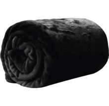 Zusammengerollte schwarze Kuscheldecke aus weichem Plüsch.