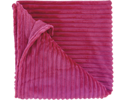 Pinkfarbene Kuscheldecke mit einer weichen, gerippten Oberflächenstruktur in Cord-Optik.