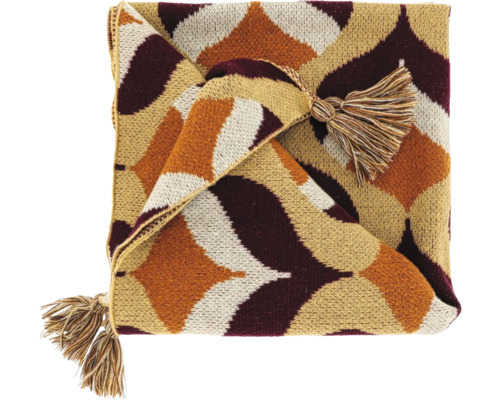 Gefaltete Strickdecke mit braunem, orangem und cremefarbenem Rautenmuster und Quasten an den Ecken.