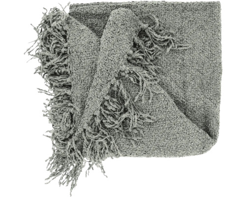 Gefaltete graue Wohndecke mit strukturierter Bouclé-Oberfläche und langen Fransen.
