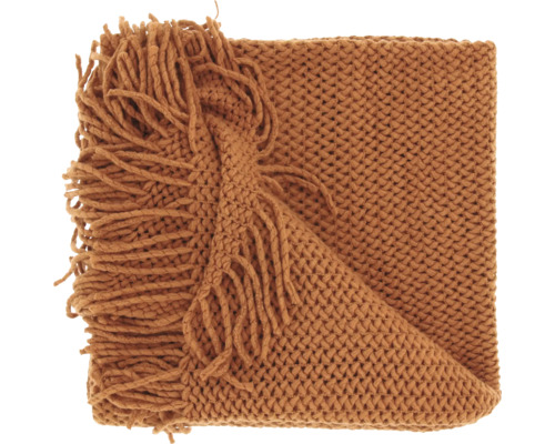 Grob gestrickte Wohndecke in Rostbraun mit Fransen.